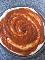 Pizza Sauce on Pizza Dough